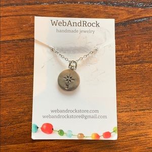 Web and Rock Due South necklace
